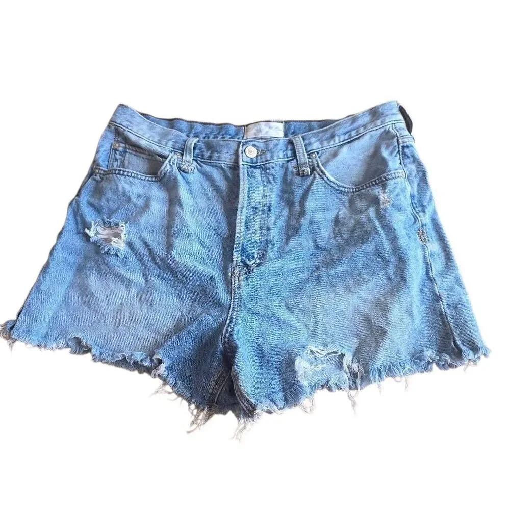 Free people we the free Sz 32 wash blue  distressed jean shorts